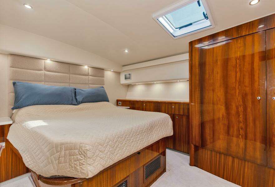 2001 65 Viking Convertible Enclosed Bridge Partnership Master Stateroom (1)