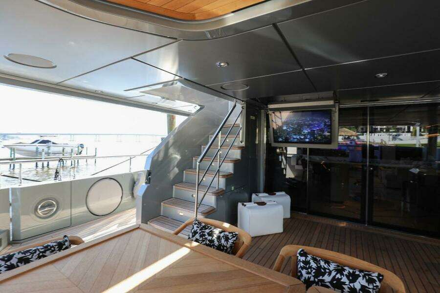 Luxurious 2025 Majesty 120 yacht interior with modern design and outdoor seating.