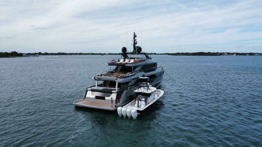 Luxury yacht Majesty 120 (2025) cruising on open water under a clear sky.