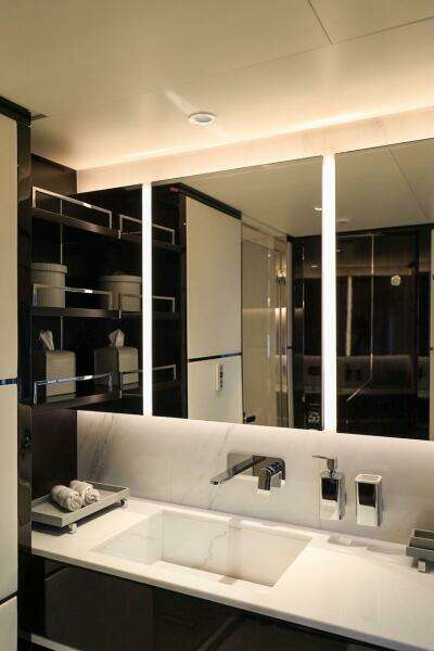 Luxurious bathroom in 2025 Majesty 120 yacht with modern fixtures and elegant design.