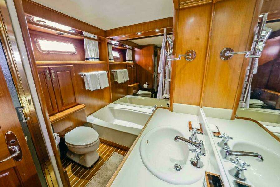 Owner's Head With Tub And Stall Shower