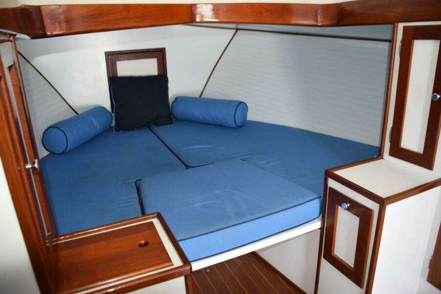 Open V Berth With Filler Cushion, Wood Trim