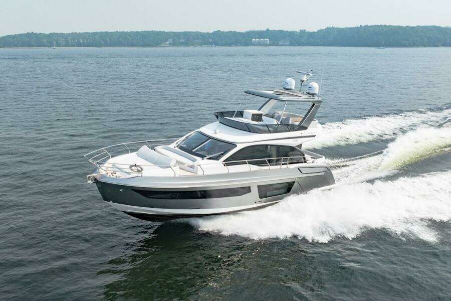 2023 Azimut Fly 53 yacht cruising on open water, showcasing sleek design and luxury features.