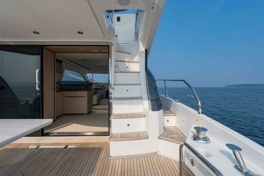 2023 Azimut Fly 53 yacht interior with stairs, ocean view, and modern design.