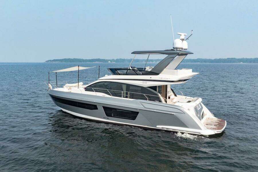 2023 Azimut Fly 53 yacht cruising on open water, showcasing sleek design and luxury features.
