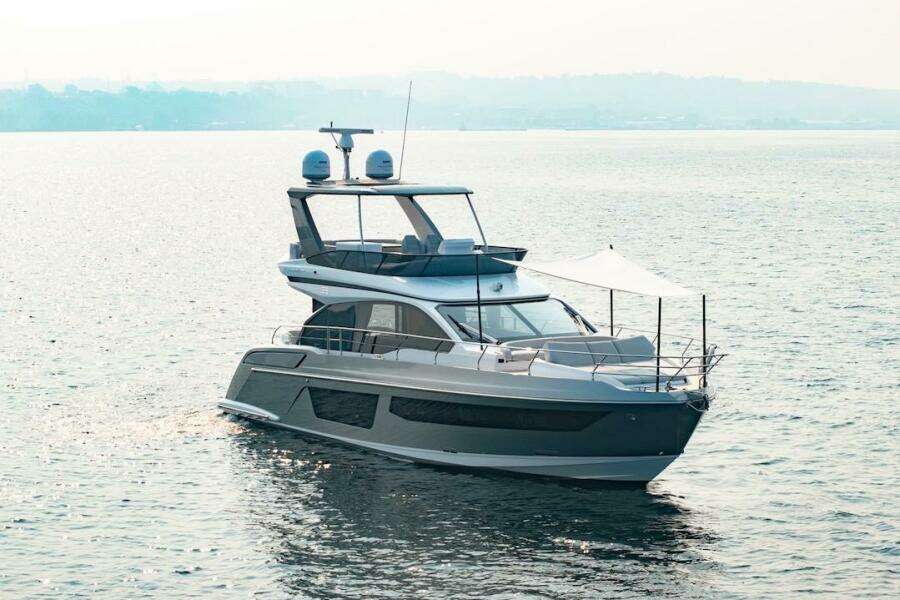 2023 Azimut Fly 53 yacht cruising on calm waters.