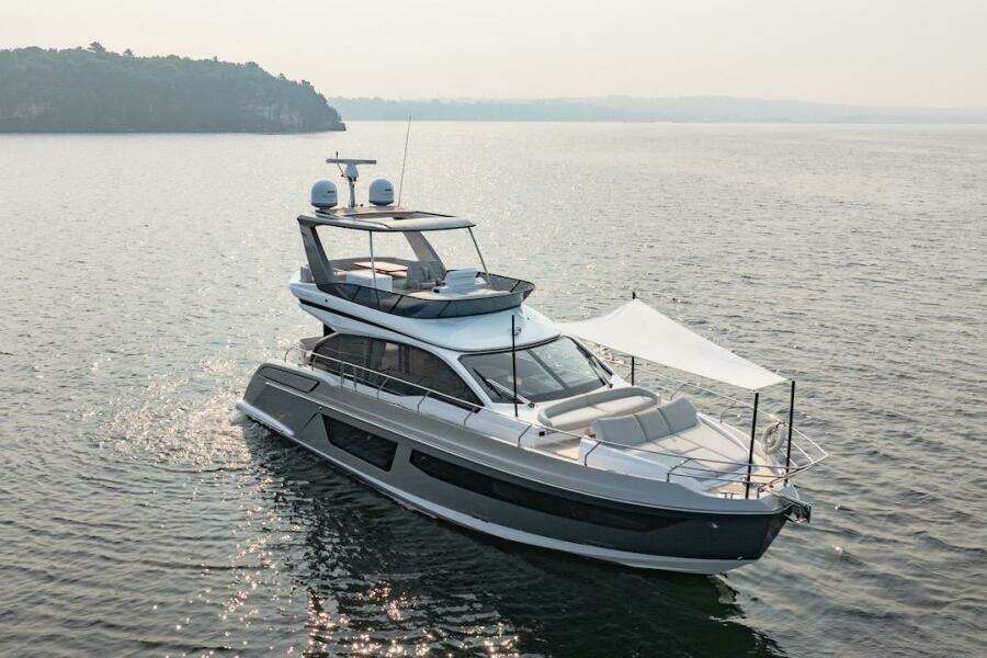 2023 Azimut Fly 53 yacht cruising on calm waters.