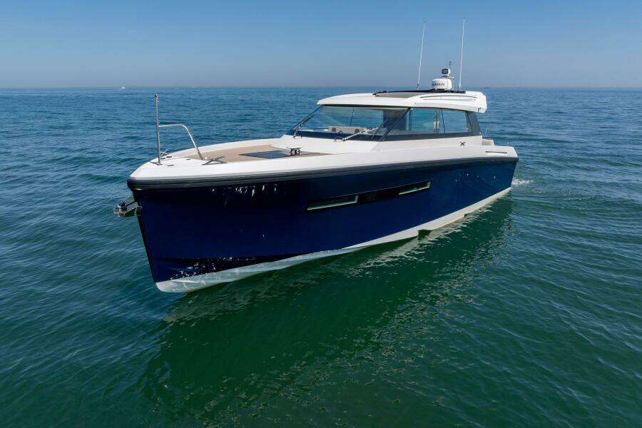 2023 Delta Powerboats 33 Coupe London Calling portside forward quarter drone