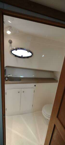 Vanity in enclosed head