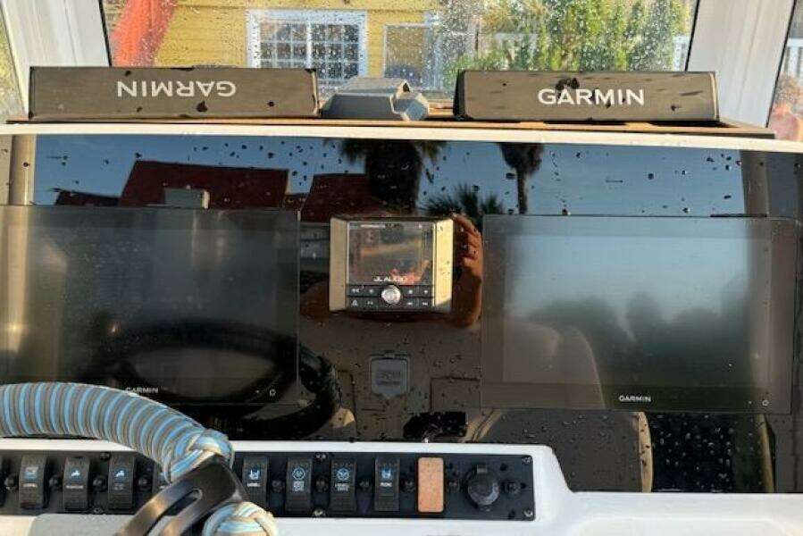 Dashboard of 2018 Sea Hunt BX 25 FS with Garmin navigation displays.