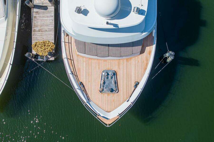Aerial view of 1996 ABD 90 Explorer yacht docked at marina.