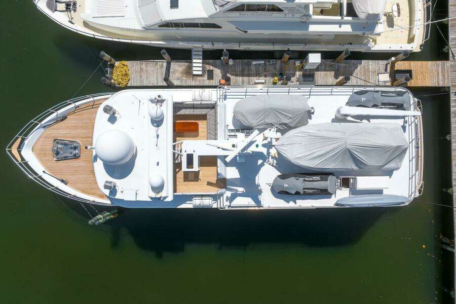Aerial view of 1996 ABD 90 Explorer yacht docked at marina.