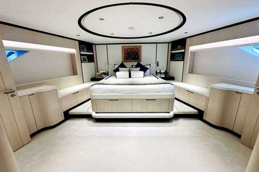 Luxurious 2023 Majesty 120 yacht bedroom with modern design and elegant furnishings.