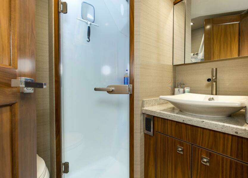 2016 92 Viking Enclosed Bridge Touche Captain's Stateroom Head