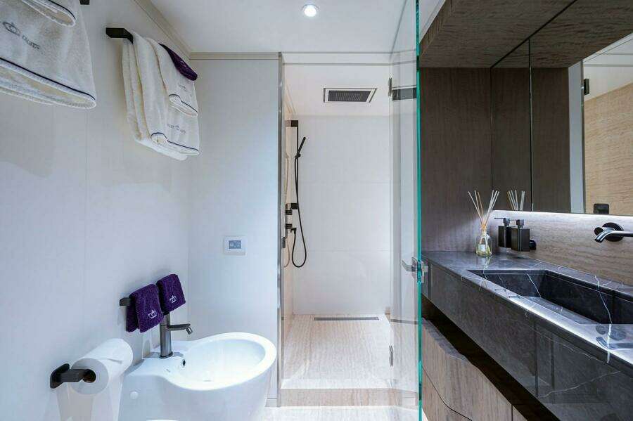 Luxurious bathroom in 2020 Majesty 140 yacht with modern fixtures and elegant design.