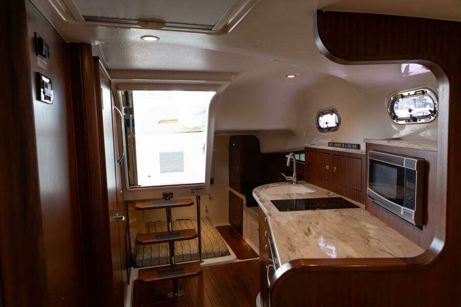 Pursuit 38 - TRACKER - Cabin Entrance and Galley