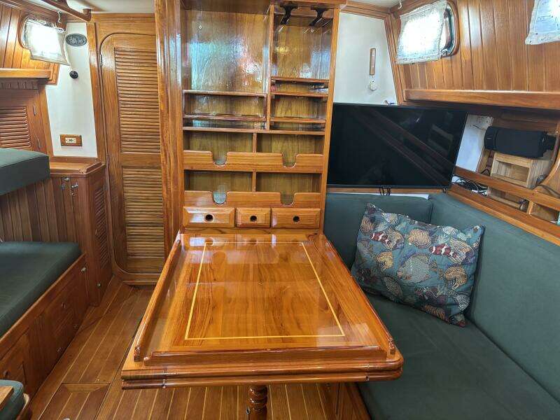 Salon table has foldout to port