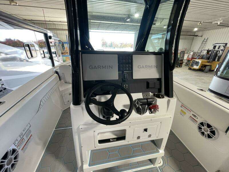 Dual Garmin Helm Electronics and Steering Console Setup