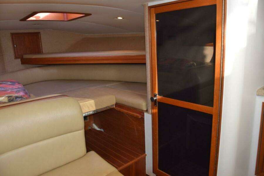 Portside Door To Head Compartment. Forward Quarter Berth And Overhead Hatch