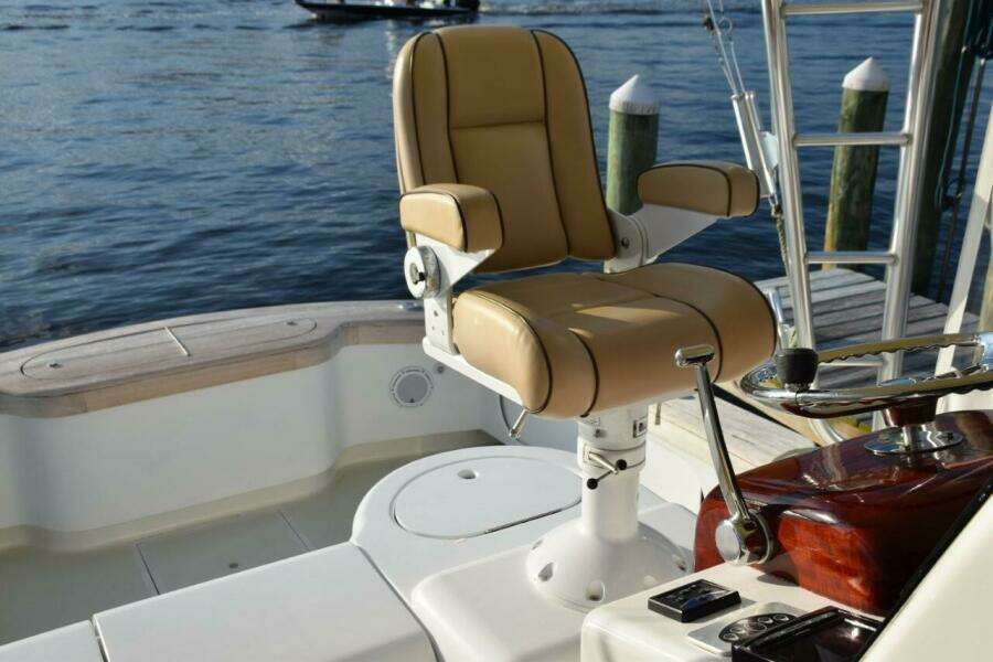 Fully Adjustable Stidd Helm Chair With Live Well Just Behind.