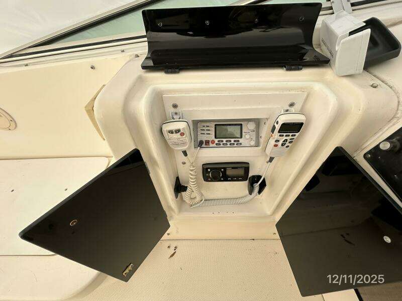 47' Bayliner flybridge helm electronics locker