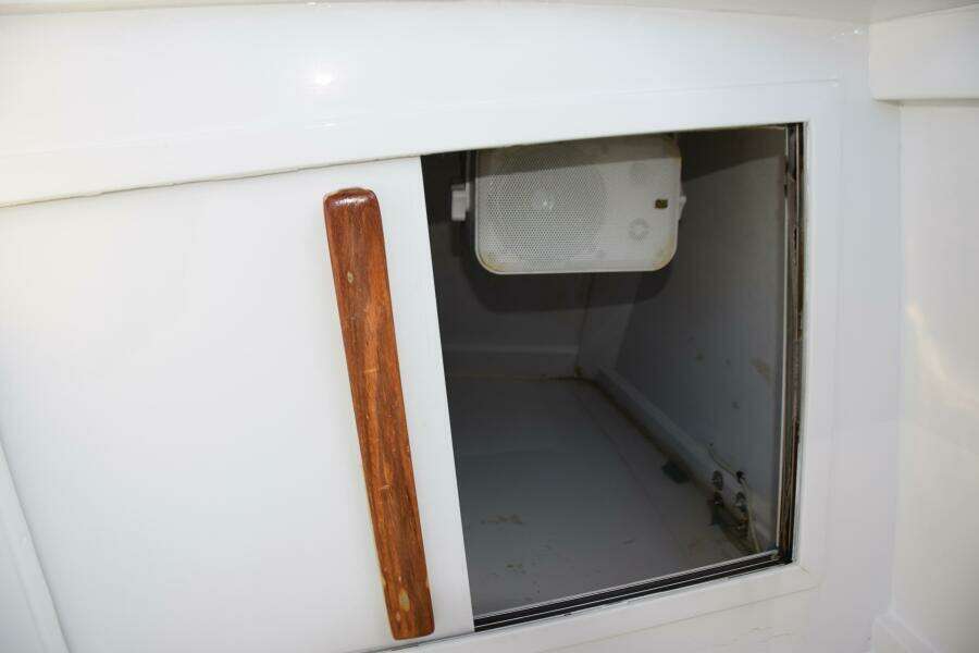 Stereo Speakers In Cabinet Below Helm
