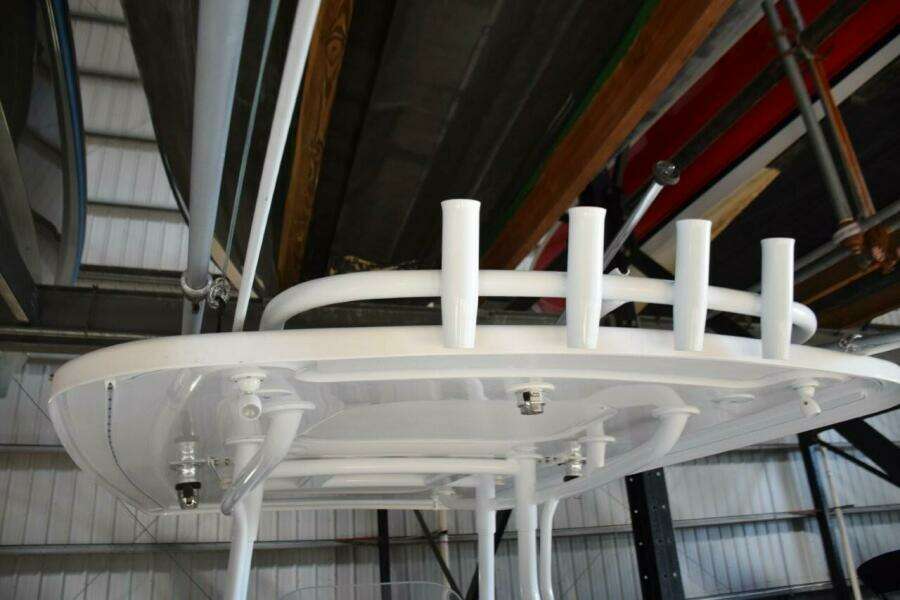 Fishing Rod Storage On Aft Hardtop, Crank Adjustable Anchorsteaming Light, LED Spreader Lights, White Powder Coated Metal Supports
